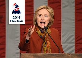 Hillary Clinton speaking into a microphone