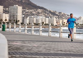 A woman running on a pier