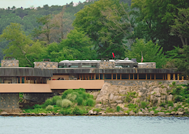 An island home inspired by Frank Lloyd Wright in New York to be marketed as corporate retreat