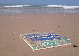 Globe-trotting for-sale sign lost at sea during Hurricane Sandy finds its way from France to New Jersey
